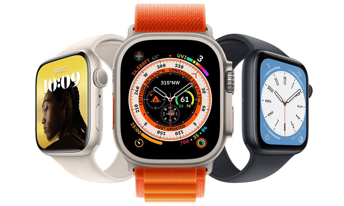 apple watches in white, orange and midnight blue