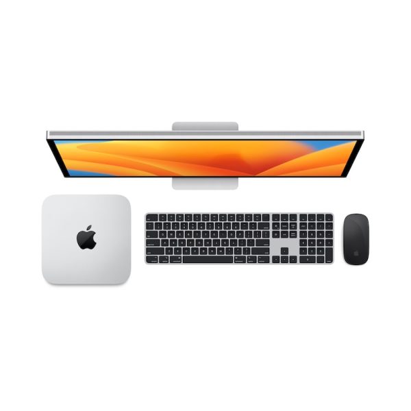 aerial view of mac mini m2 pro silver with keyboard, mouse and studio display