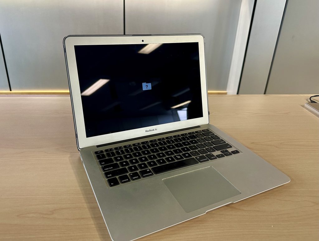 close-up of apple laptop turned on