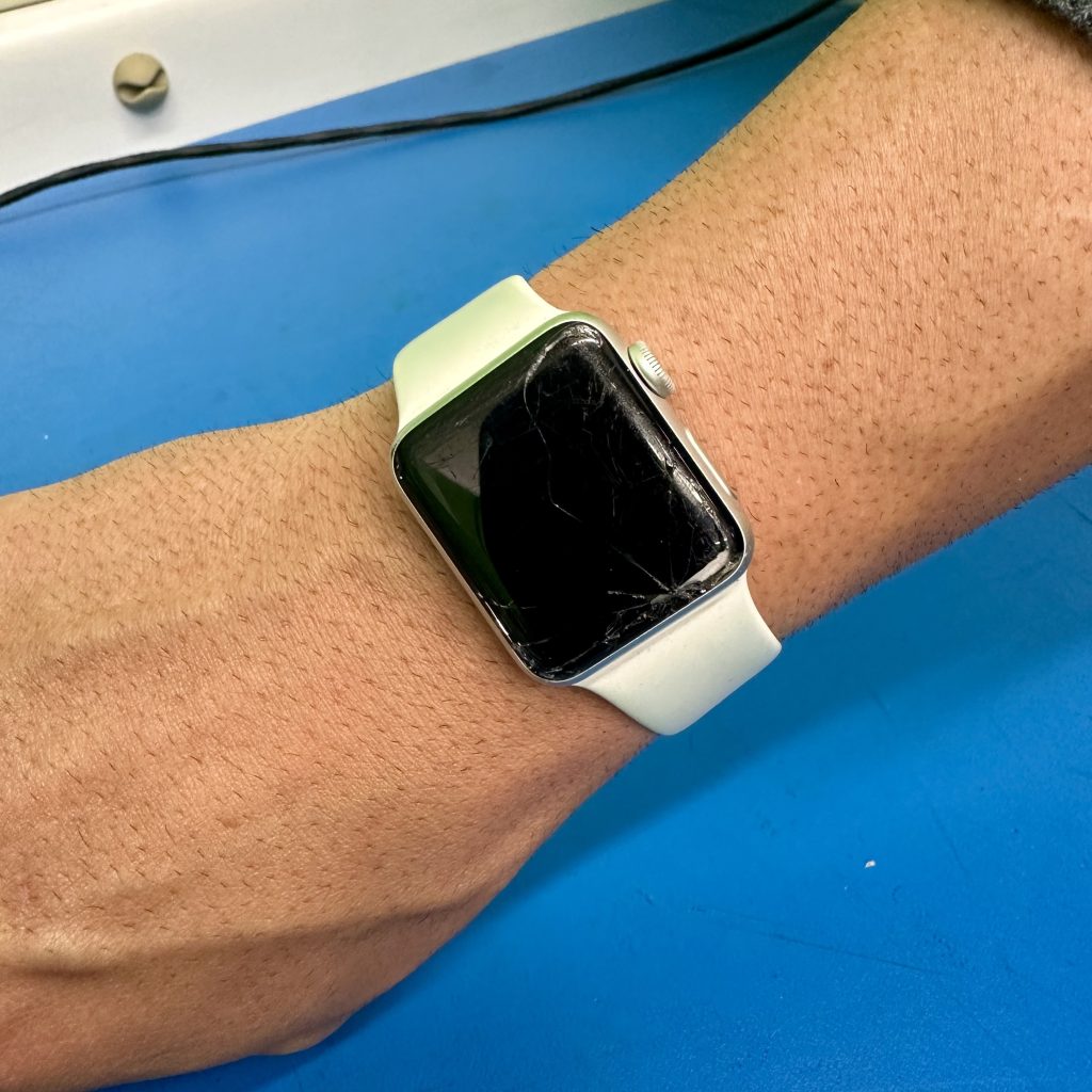 broken apple watch on wrist