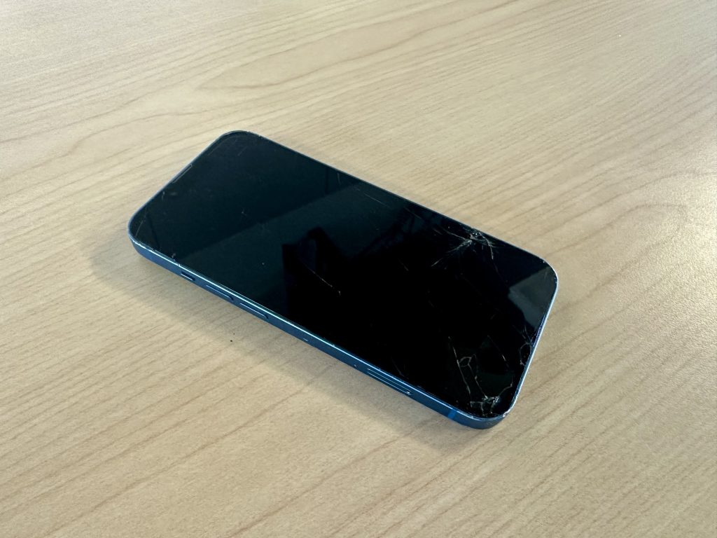 dead iphone on table